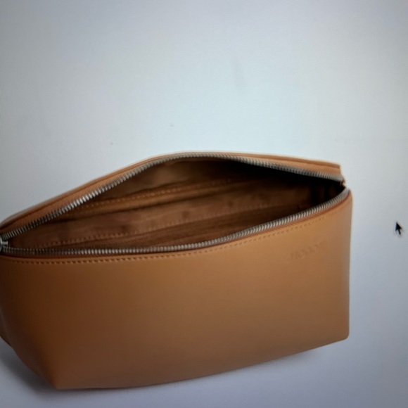 MON1500 Crafted with water-resistant, ultra microfiber vegan leather, the - Picture 9 of 10